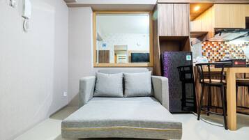 Quarto | Área de estar | TV