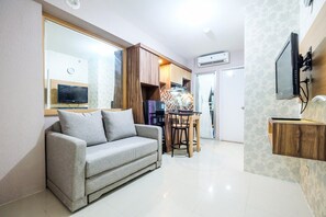 Living area - Classic 2BR Bassura City Apartment (Jakarta)