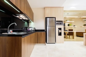 Room | Private kitchen | Fridge, microwave, stovetop, rice cooker - 2BR Cozy and Modern L'Avenue Apartment (Jakarta)