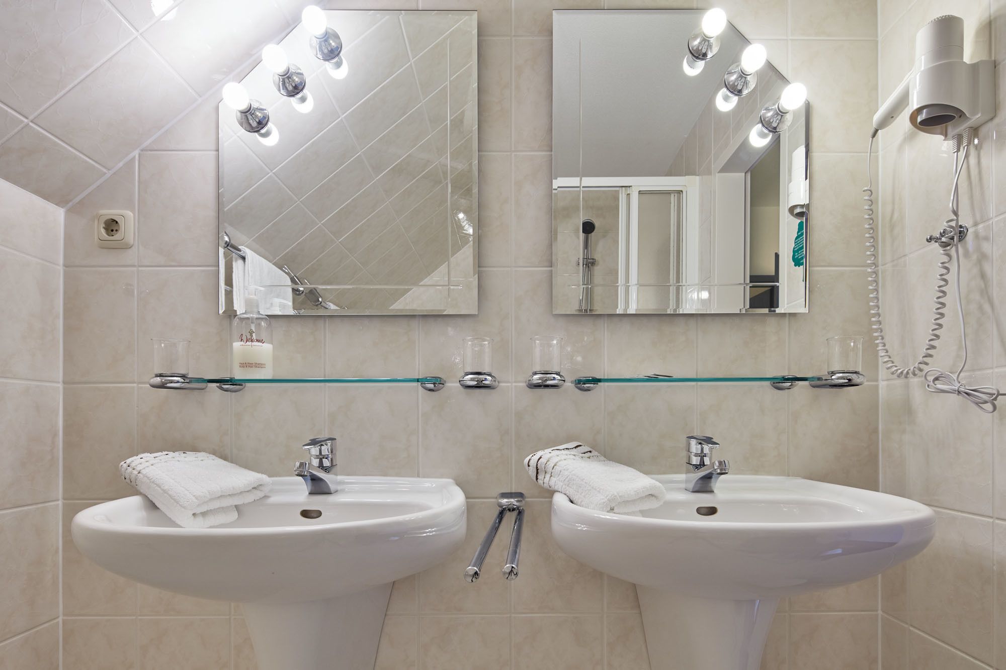 family quadruple room, multiple beds, non smoking, garden view | bathroom | shower, hair dryer, towels