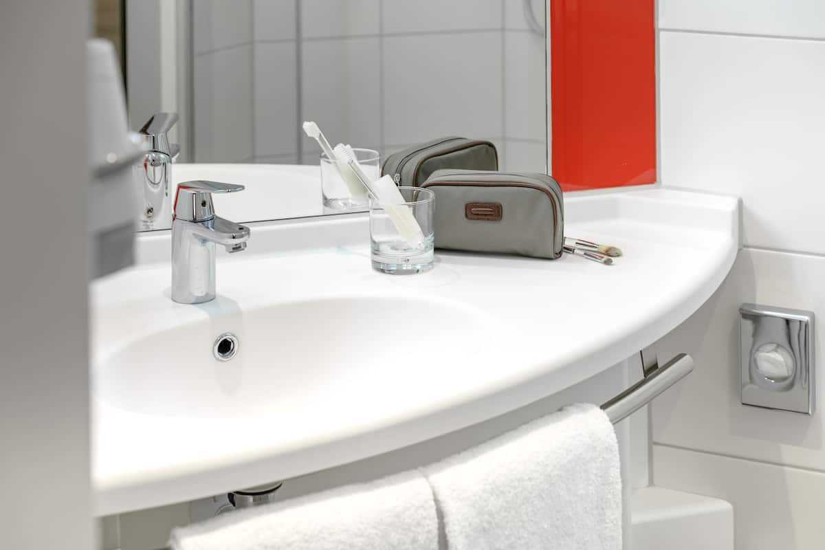 shower, eco-friendly toiletries, hair dryer, towels