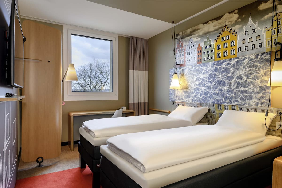 Hypo-allergenic bedding, desk, blackout curtains, soundproofing