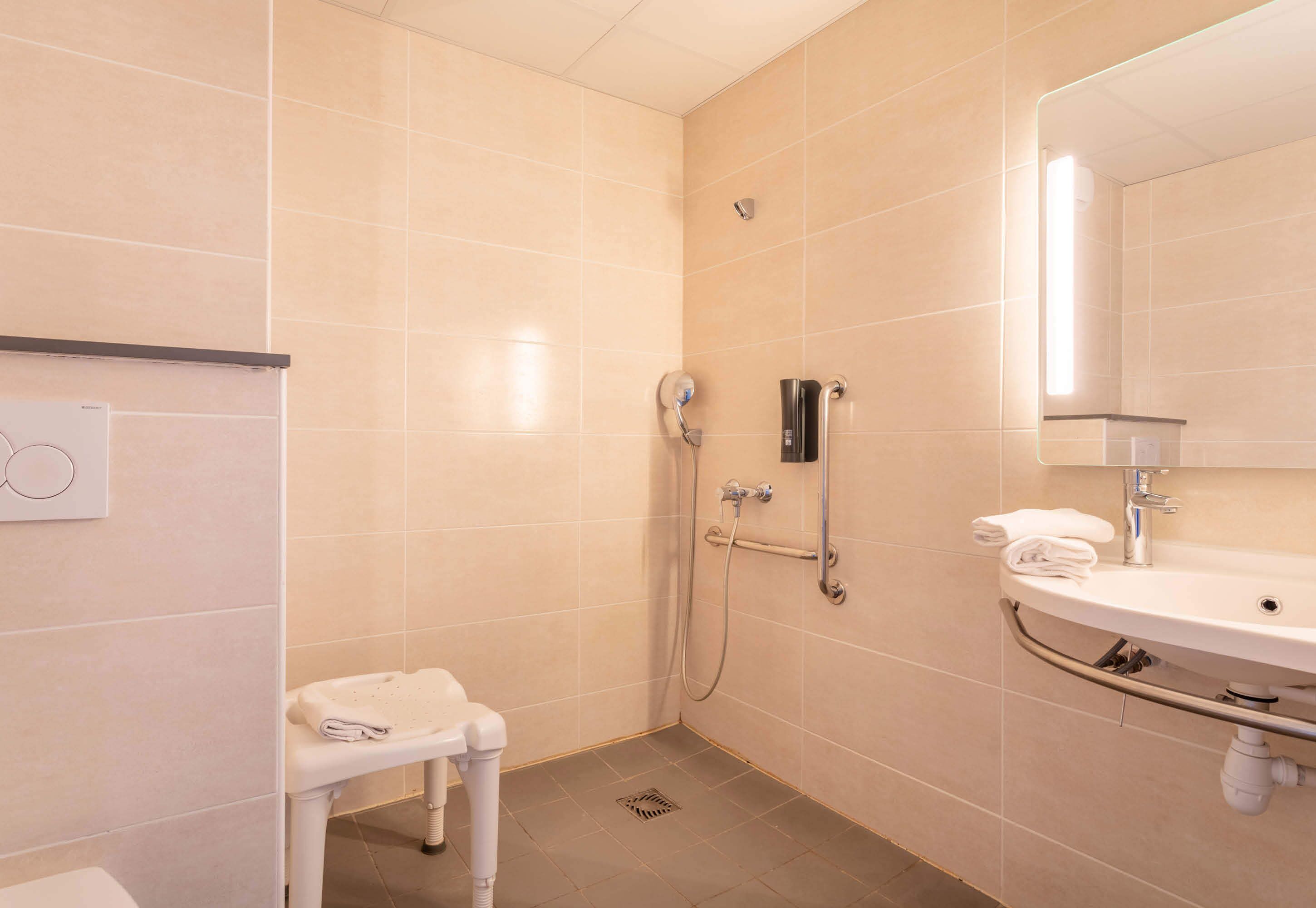 double room, accessible, non smoking | bathroom | shower, free toiletries, hair dryer, towels
