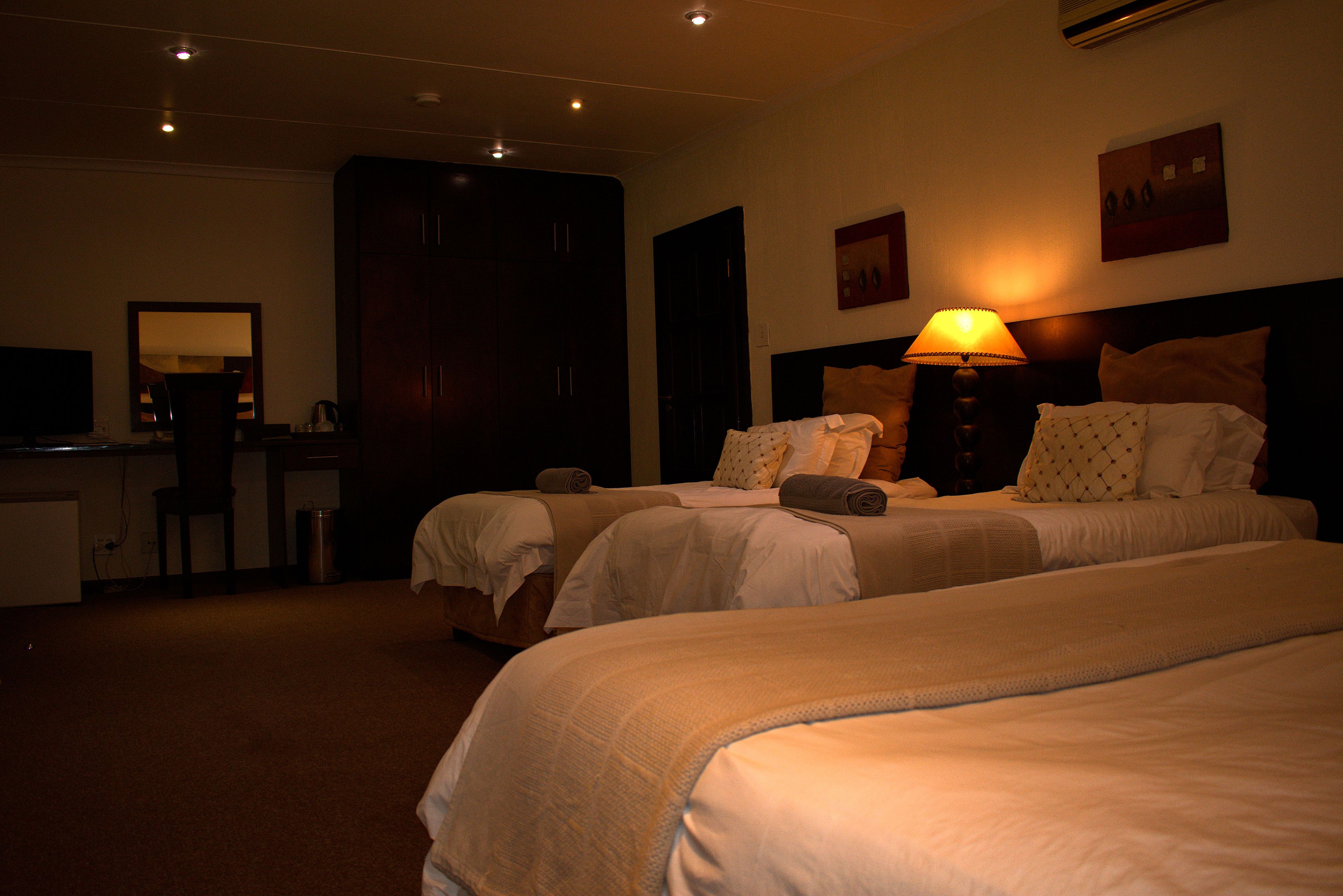 family room (large) | in-room safe, individually decorated, individually furnished, desk