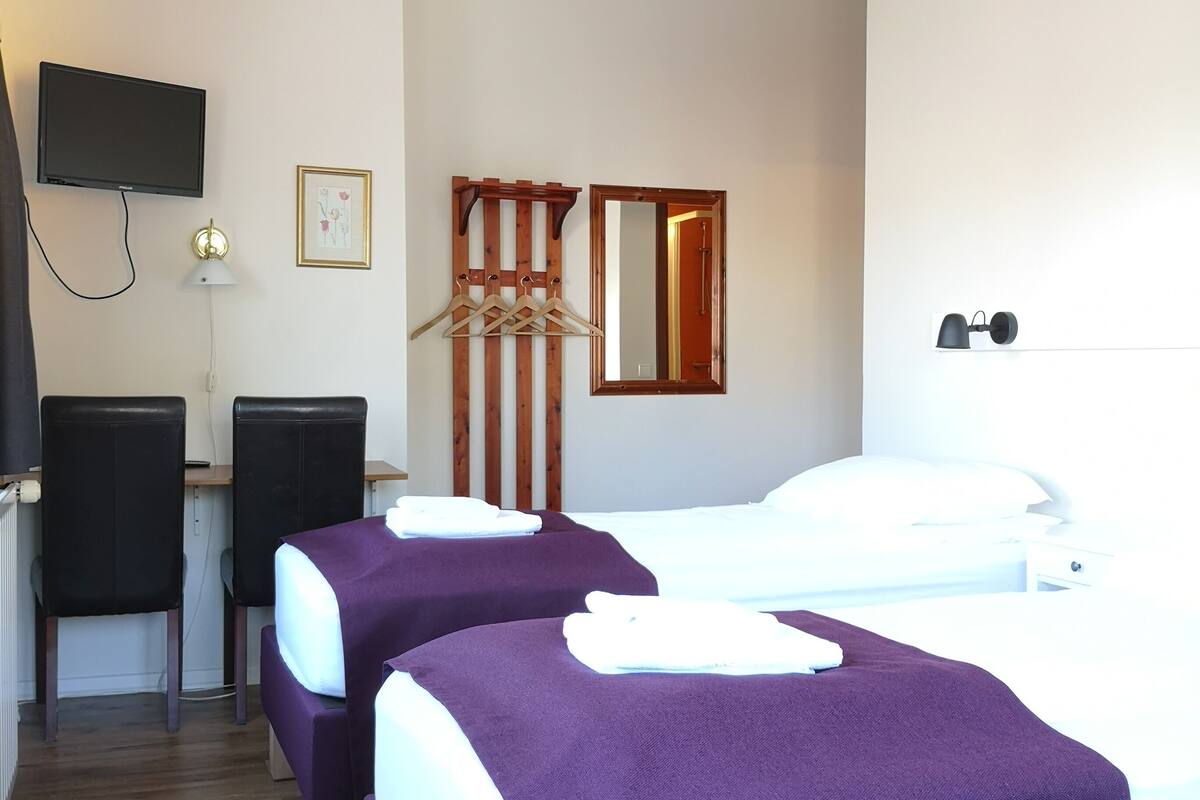 basic triple room, private bathroom | desk, blackout curtains, free cots/infant beds, free wifi