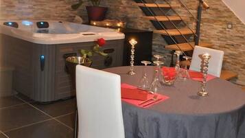 Romantic Double Room | Living area | Flat-screen TV