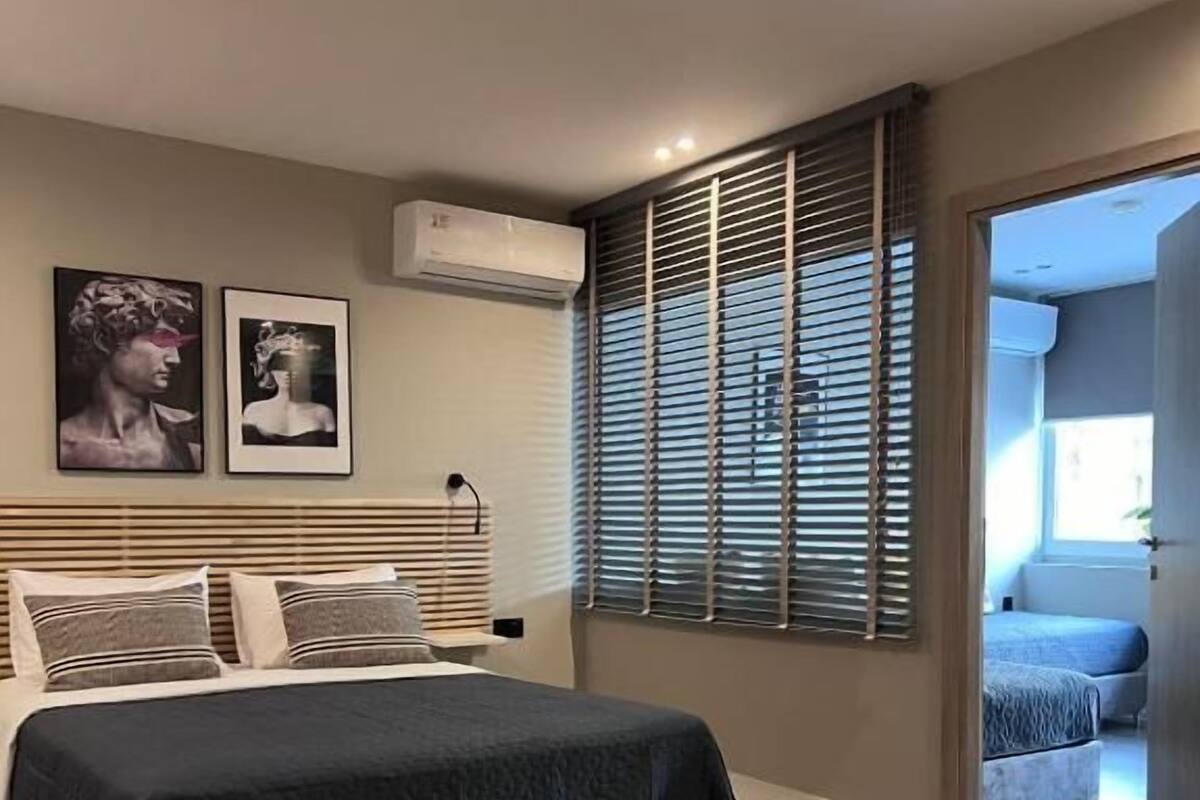 Habitación cuádruple familiar | Sábanas de algodón egipcio y ropa de cama de alta calidad