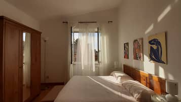 Frette Italian sheets, premium bedding, down comforters