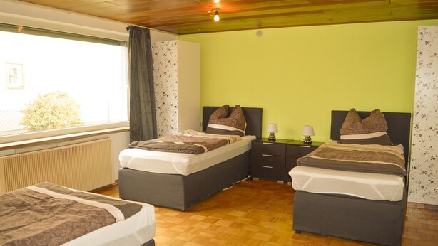 Comfort Triple Room, 3 Twin Beds, Non Smoking, Courtyard View | Rollaway beds (surcharge), WiFi (free), bed sheets - alpha-spot Weißenhorn (Weissenhorn)