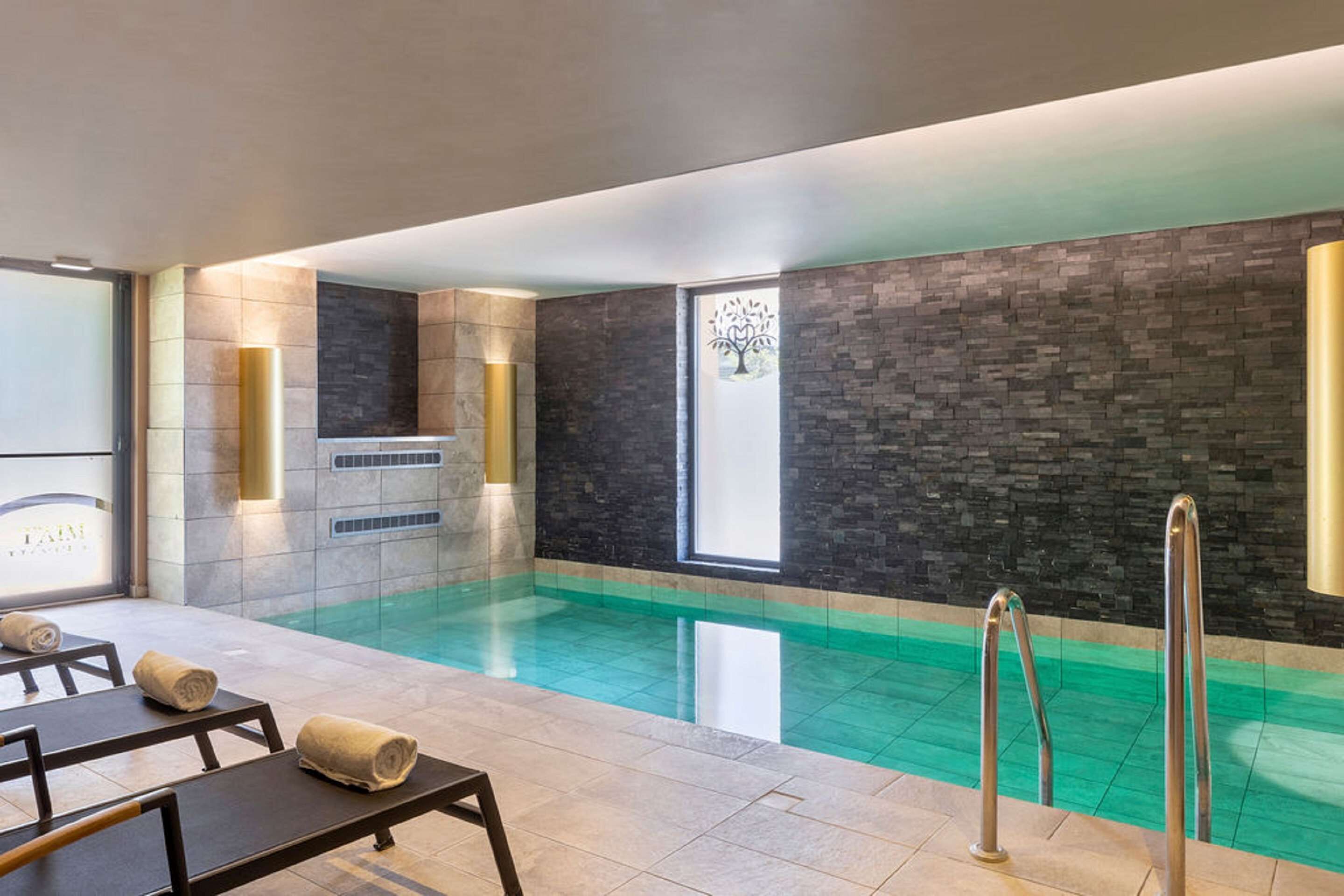 indoor pool, pool loungers