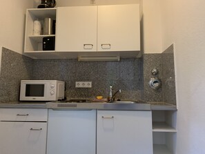 Comfort Studio, 1 King Bed, Non Smoking, City View | Private kitchen | Fridge, microwave, stovetop, coffee/tea maker