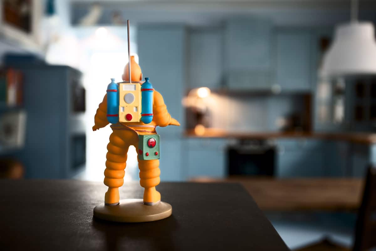 A toy figure on a table.
