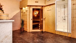A sauna room with a wooden interior, a glass-enclosed shower area, and a marble counter. - La Ferme des Prés (Neuilly-en-Sancerre)