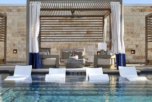Seasonal outdoor pool, pool loungers