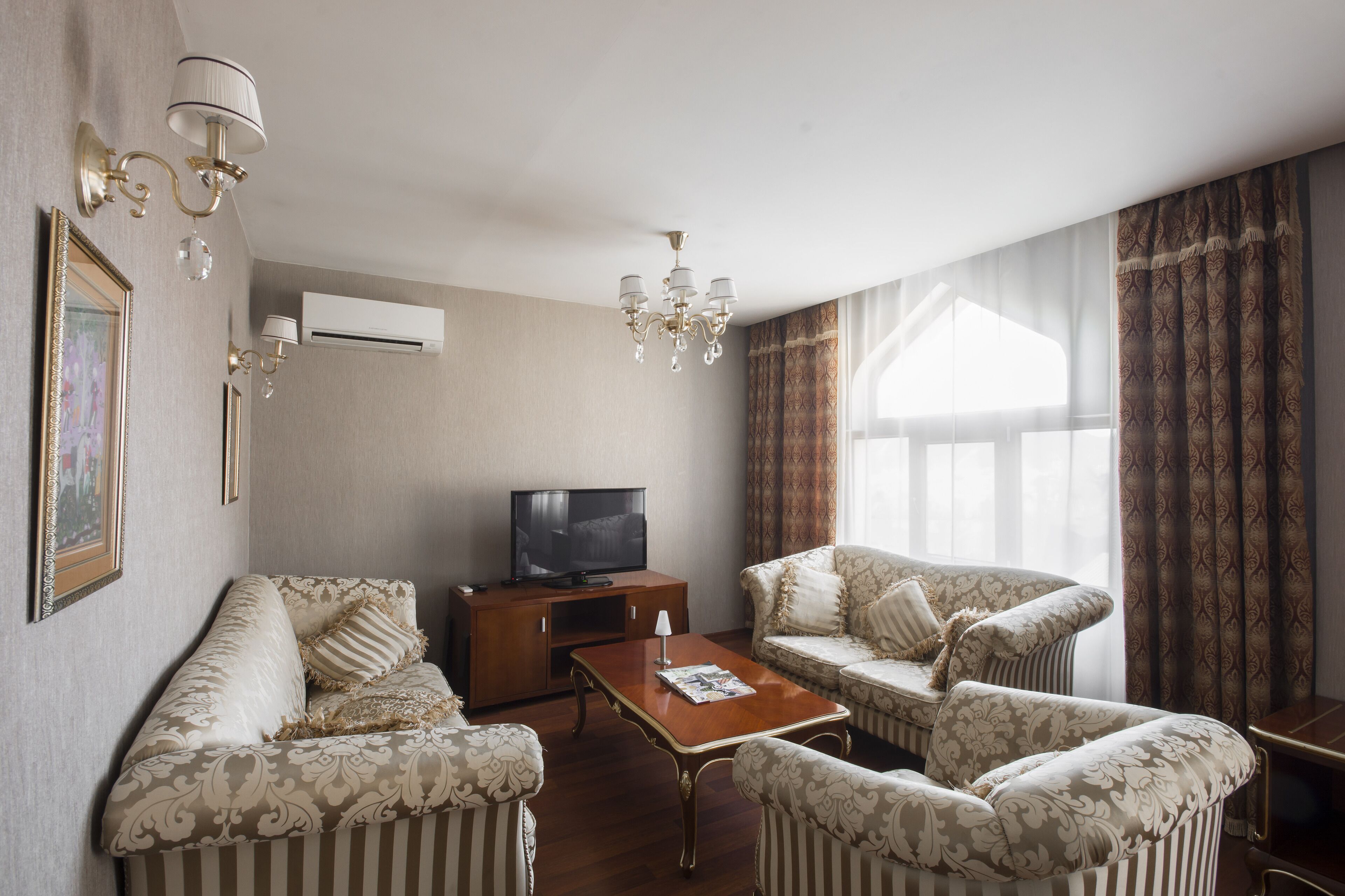 family suite | living area | lcd tv, heated floors