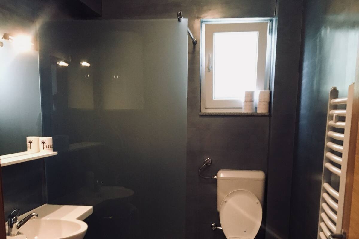 Shower, free toiletries, bathrobes, slippers