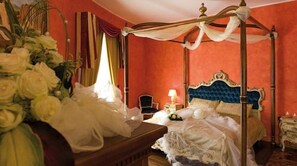 Deluxe Suite, Jetted Tub | Minibar, desk, blackout curtains, iron/ironing board