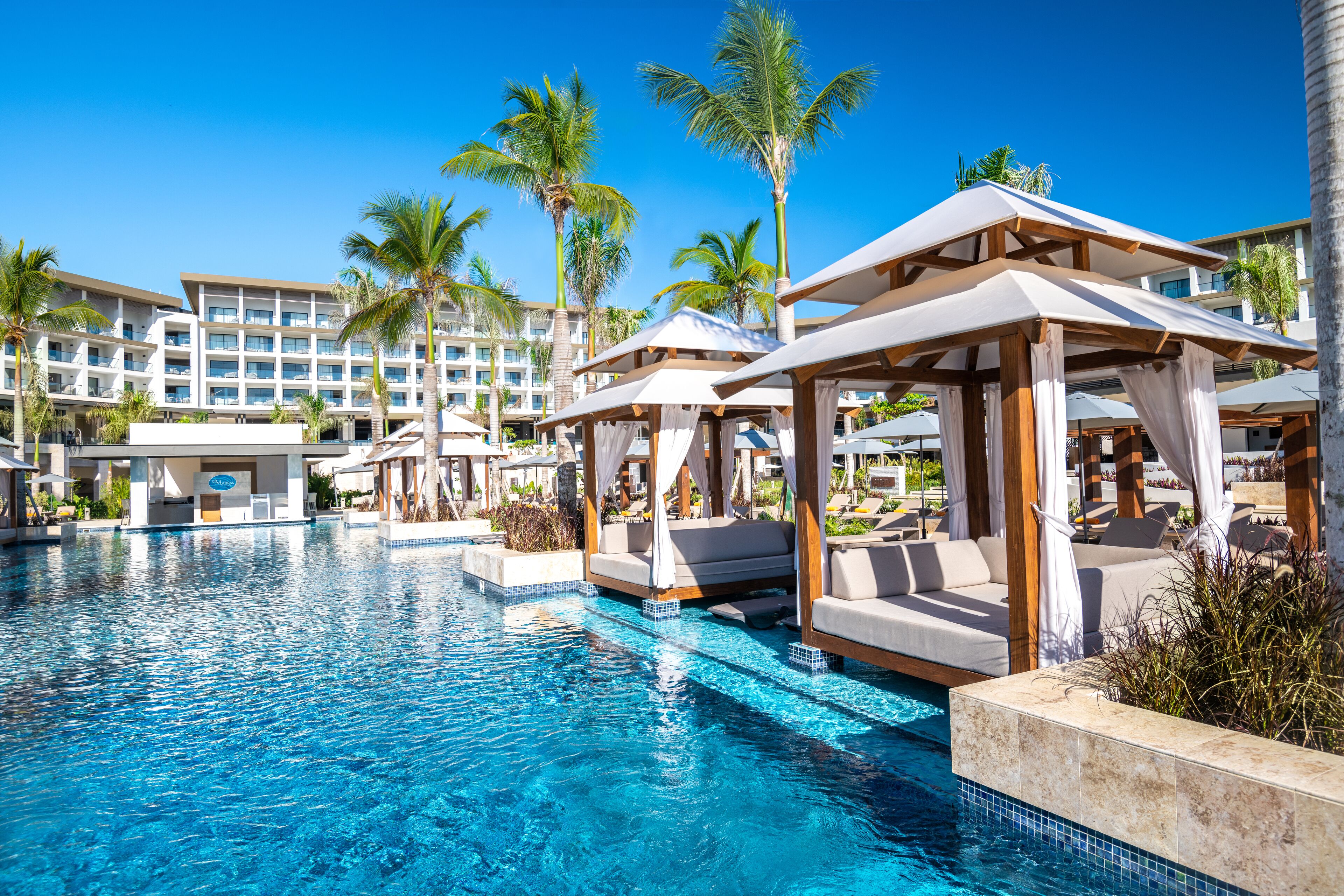 3 outdoor pools, cabanas (surcharge), pool umbrellas