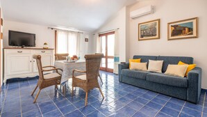 Apartment, 2 Bedrooms | Living area | Flat-screen TV - AffittaSardegna - Attico Mare (Dorgali)