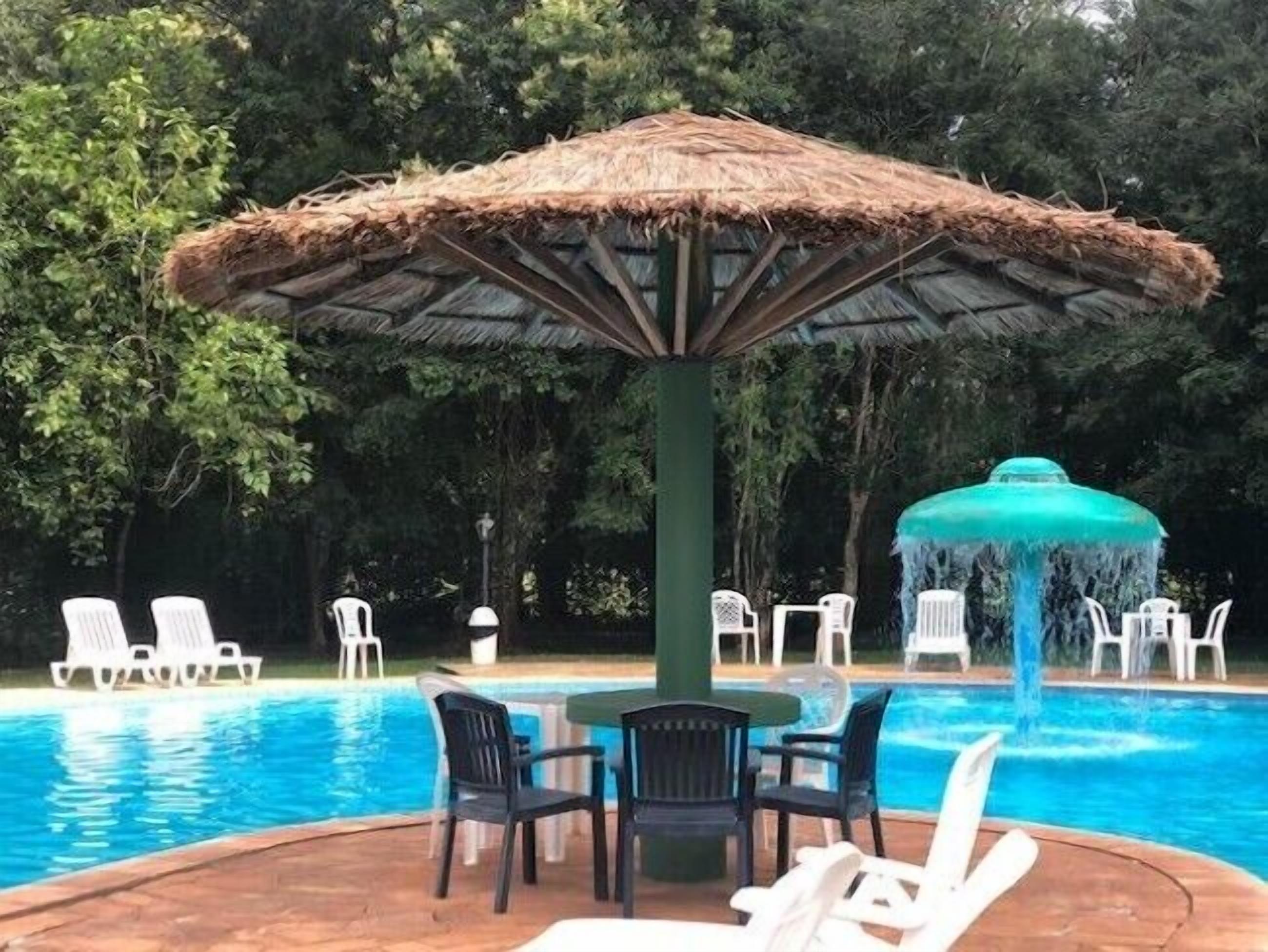 outdoor pool, pool umbrellas, pool loungers