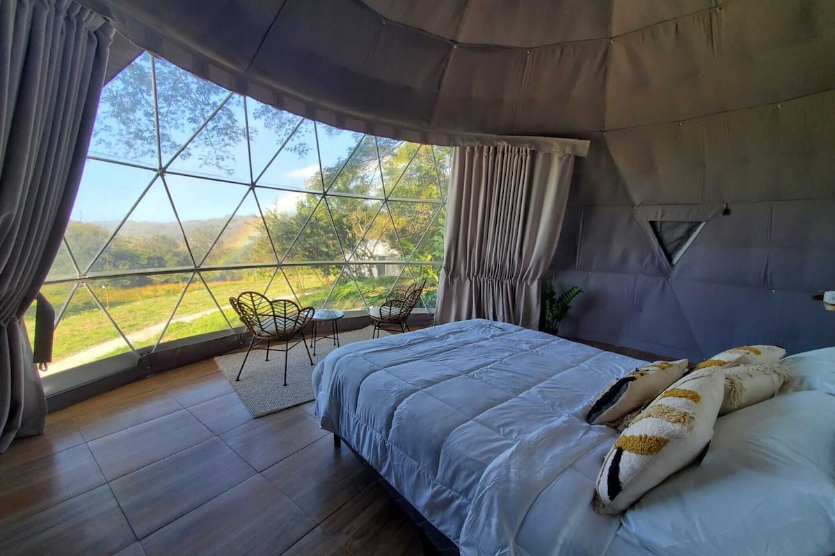 Deluxe Tent | Egyptian cotton sheets, premium bedding, desk, free WiFi