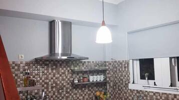 Microwave, coffee/tea maker, cookware/dishes/utensils