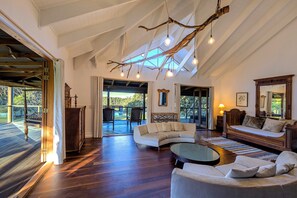 Family House, 6 Bedrooms, Ocean View | Living area | 36-inch flat-screen TV with cable channels, TV, ping pong - Tranquilo Beach House (Woolgoolga)