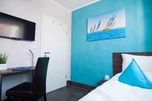 Appartement Confort, 4 chambres, terrasse, vue ville | Literie hypoallergénique, bureau, fer et planche à repasser