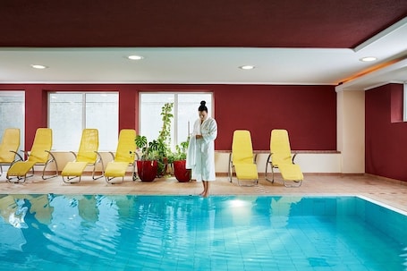 Indoor pool, open 7:00 AM to 9:30 PM, sun loungers