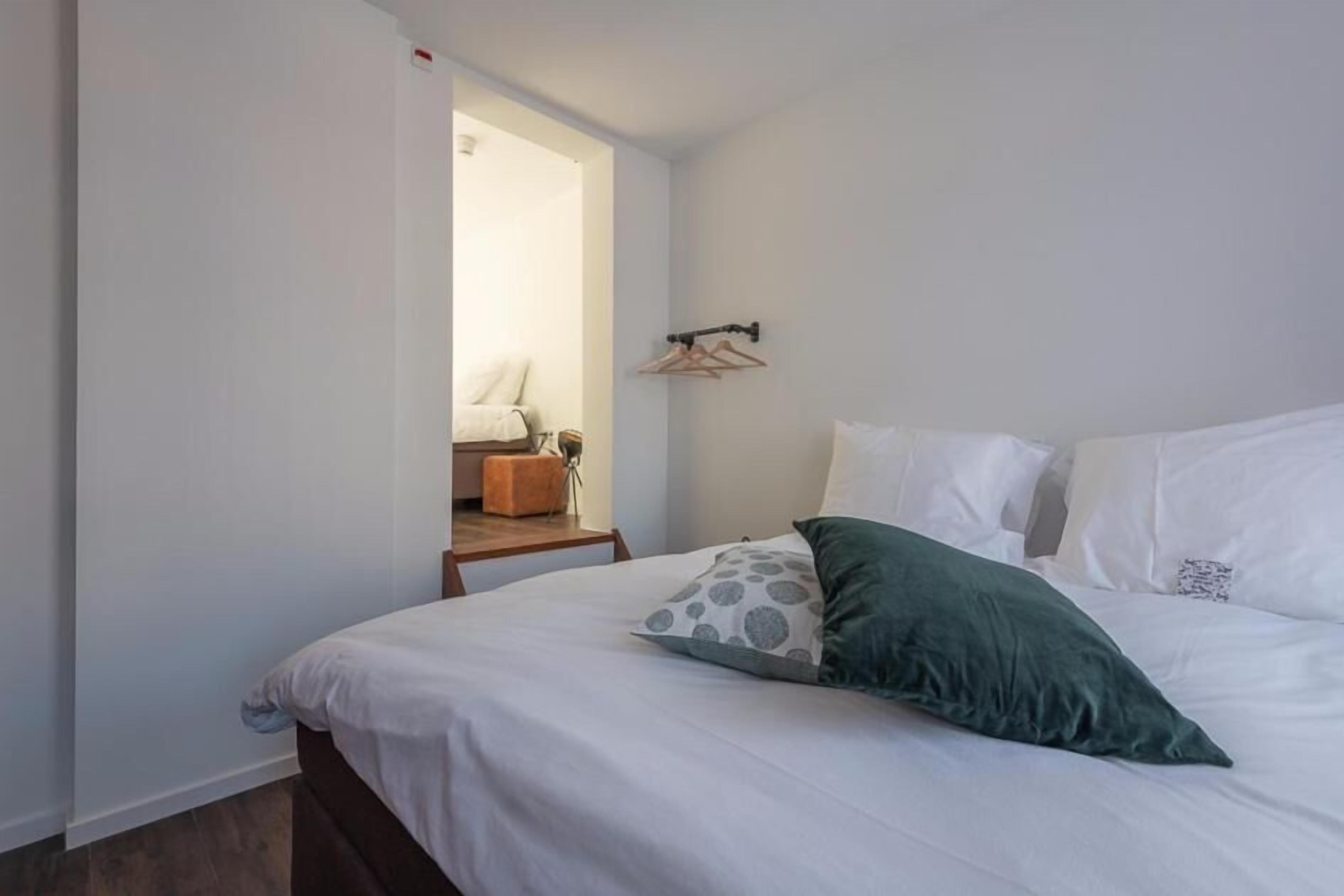 Blackout drapes, soundproofing, WiFi (free), bed sheets