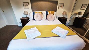 2 dormitorios, tabla de planchar con plancha, wifi gratis y ropa de cama