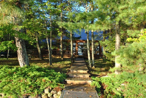 Beautiful round lake northern cedar modern vacation home