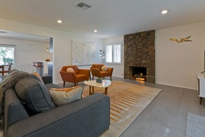 Smart TV, fireplace, DVD player, books