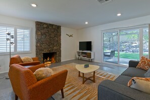 Smart TV, fireplace, DVD player, books