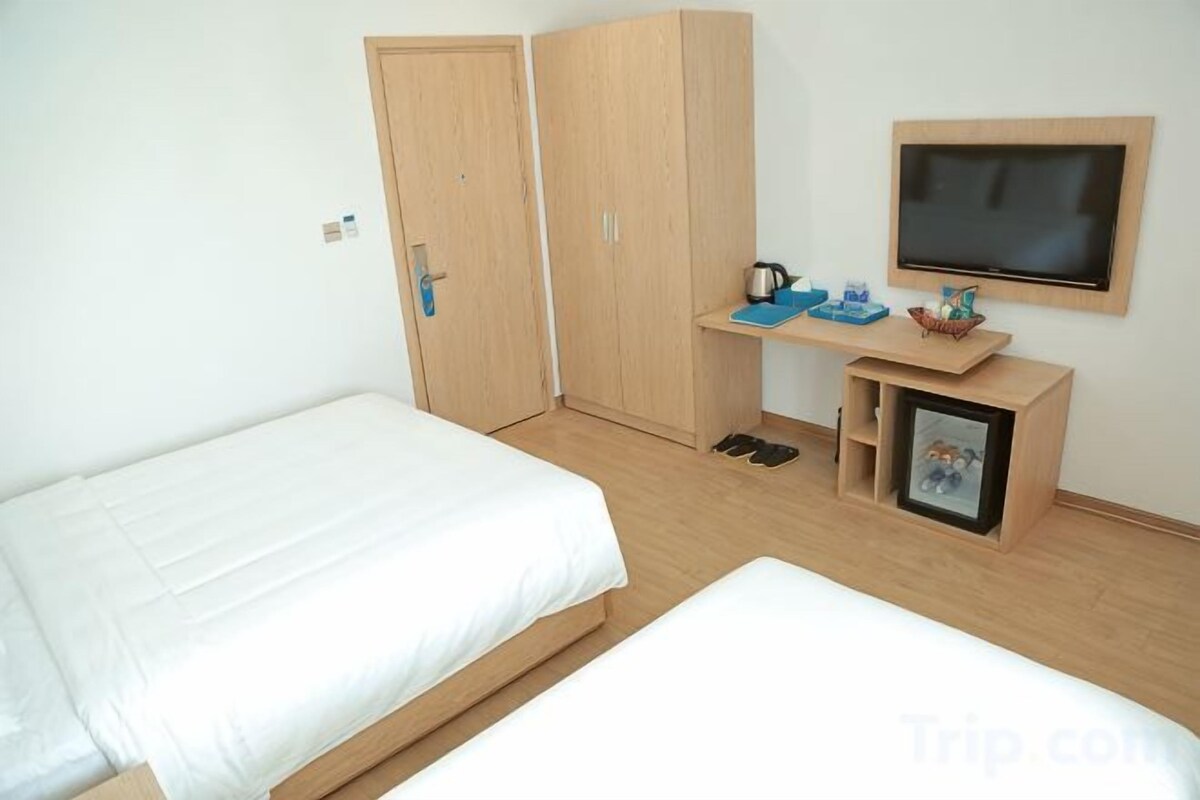 Premium bedding, down comforters, memory foam beds, minibar
