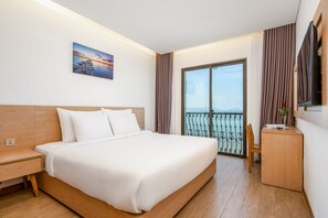 Habitación doble Deluxe, vista al mar | Ropa de cama de alta calidad, edredón y camas con efecto memoria