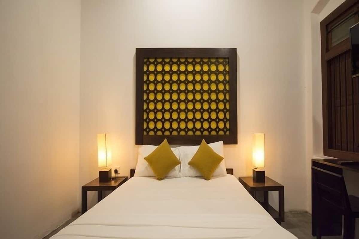 Ropa de cama de alta calidad, minibar, caja fuerte