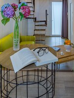 Deluxe Double Suite with Sea View | Living area | 40-inch flat-screen TV with digital channels