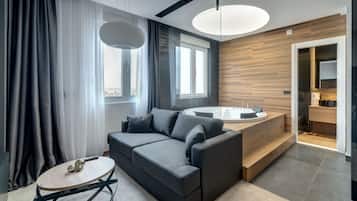 Suite Mewah, 1 Tempat Tidur King dengan tempat tidur Sofa | Seprai antialergi, minibar, brankas, dan meja kerja