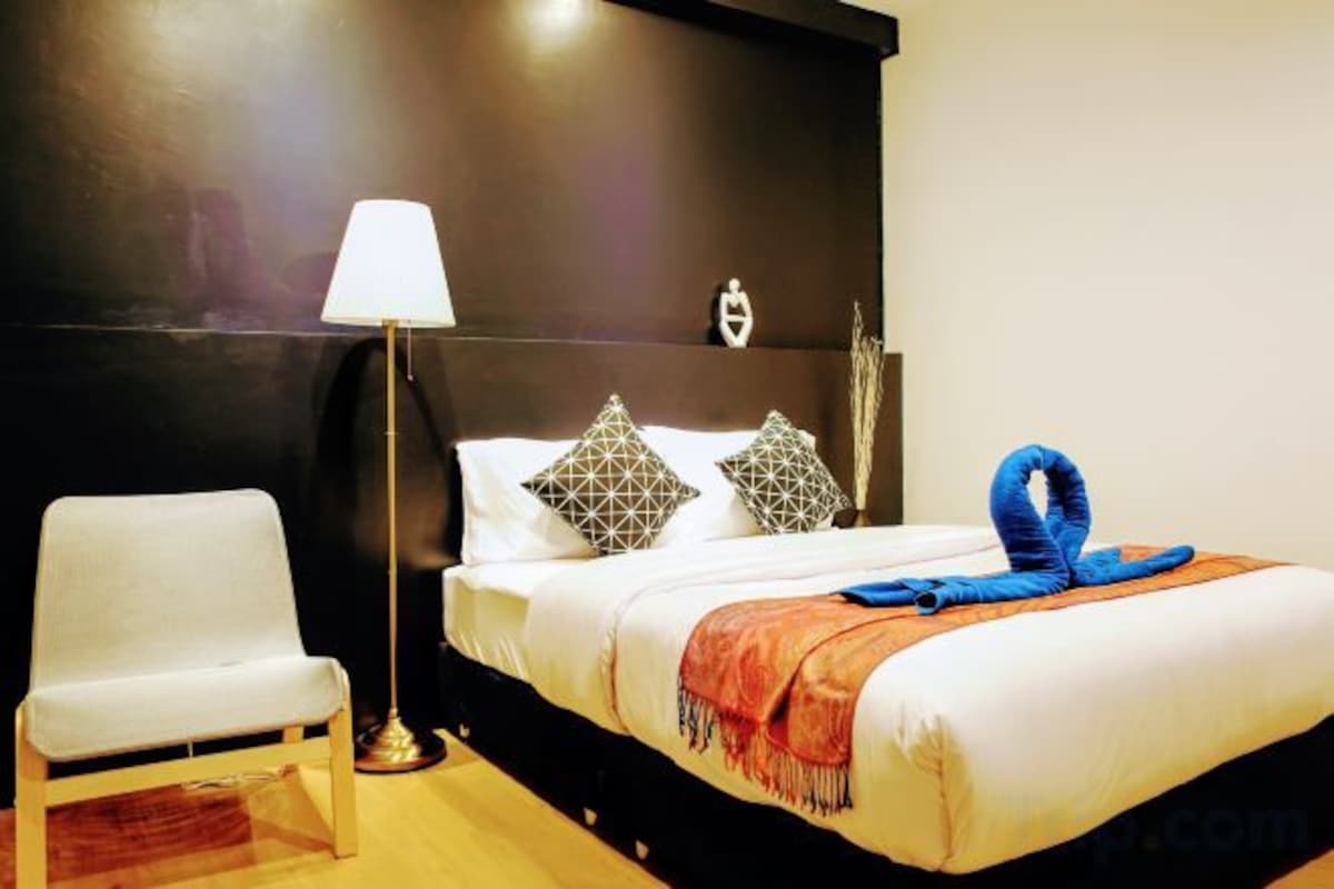 Desk, laptop workspace, blackout curtains, free WiFi