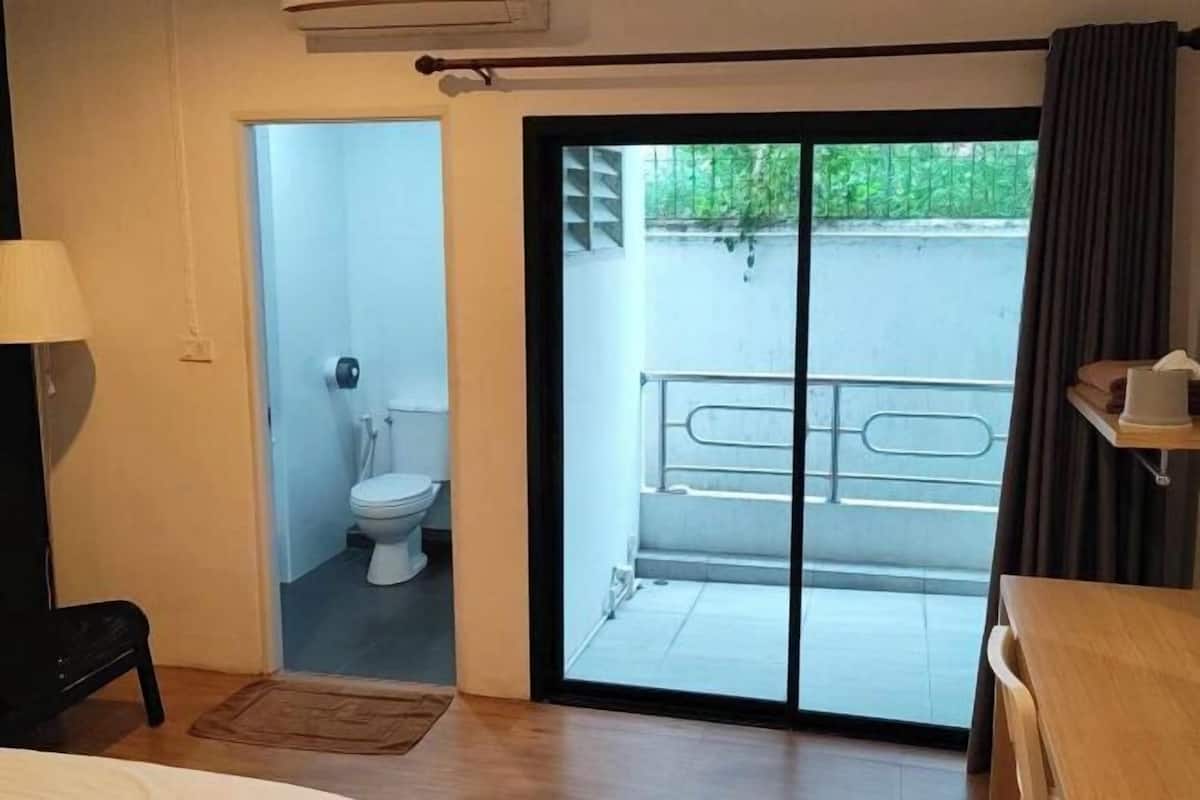 Desk, laptop workspace, blackout curtains, free WiFi