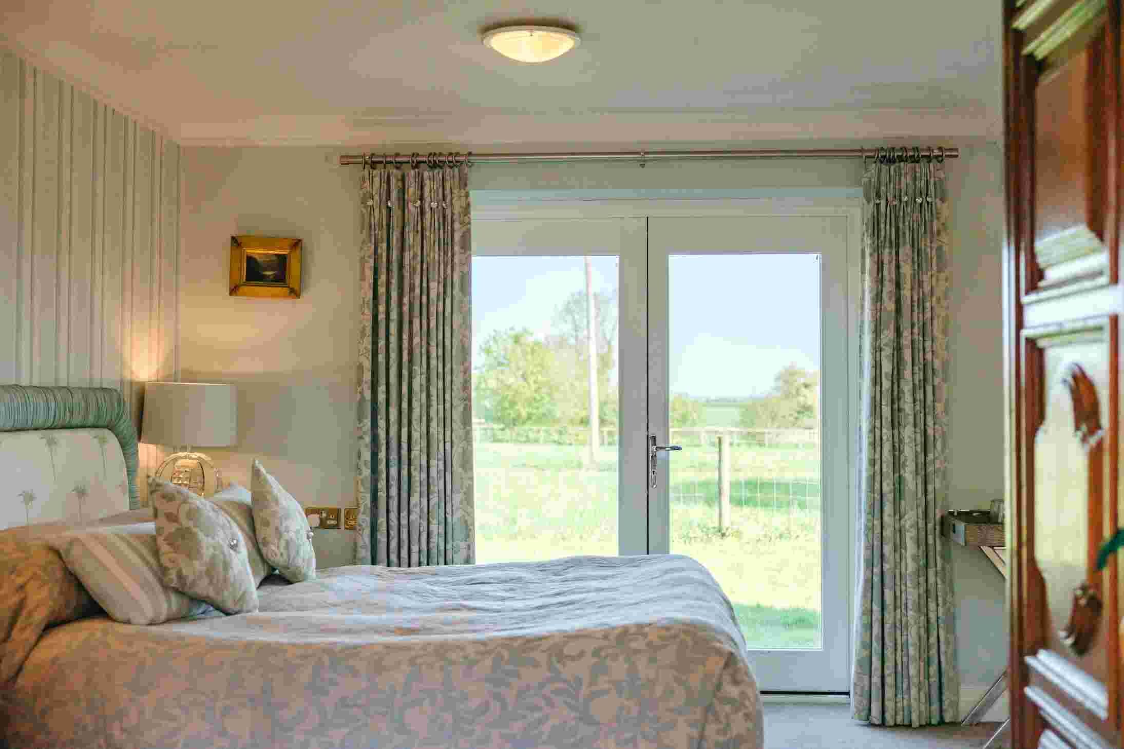 Deluxe Double Room | Minibar, blackout drapes, iron/ironing board, free WiFi