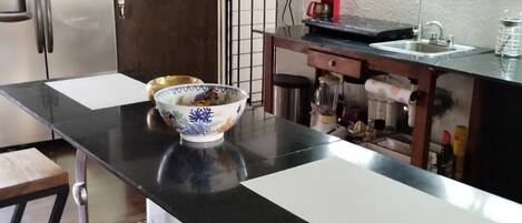 Economy Triple Room, 1 Double Bed, Smoking, Shared Bathroom | Living area