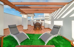 Outdoor dining - Apartment in Hacienda Golf Islantilla Urbanization (Isla Cristina)