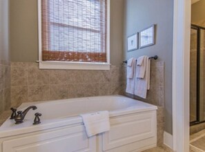 Combined shower/tub, hair dryer, towels, soap
