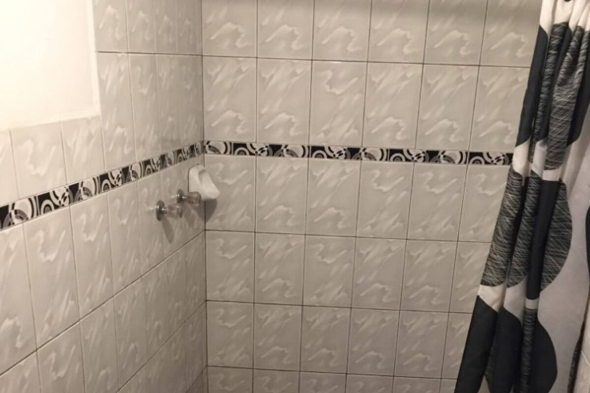 Shower, rainfall showerhead, towels