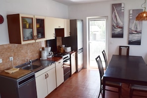 Panoramic Apartment, Sea View (Free sauna) | Private kitchen | Full-sized fridge, microwave, oven, stovetop