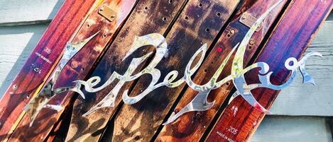A wooden structure with metal elements and the text "Berkar".