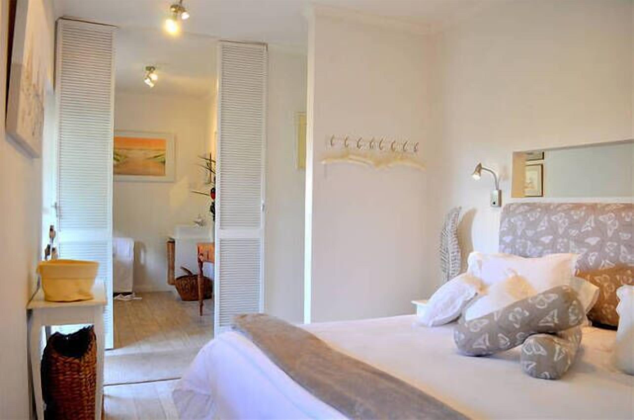 1 bedroom, desk, iron/ironing board, bed sheets