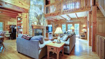 Smart TV, chimenea, reproductor de DVD y futbolito